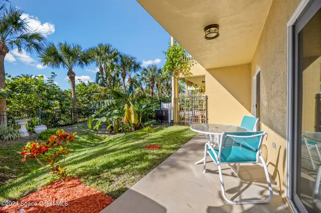 a view of a building with a garden
