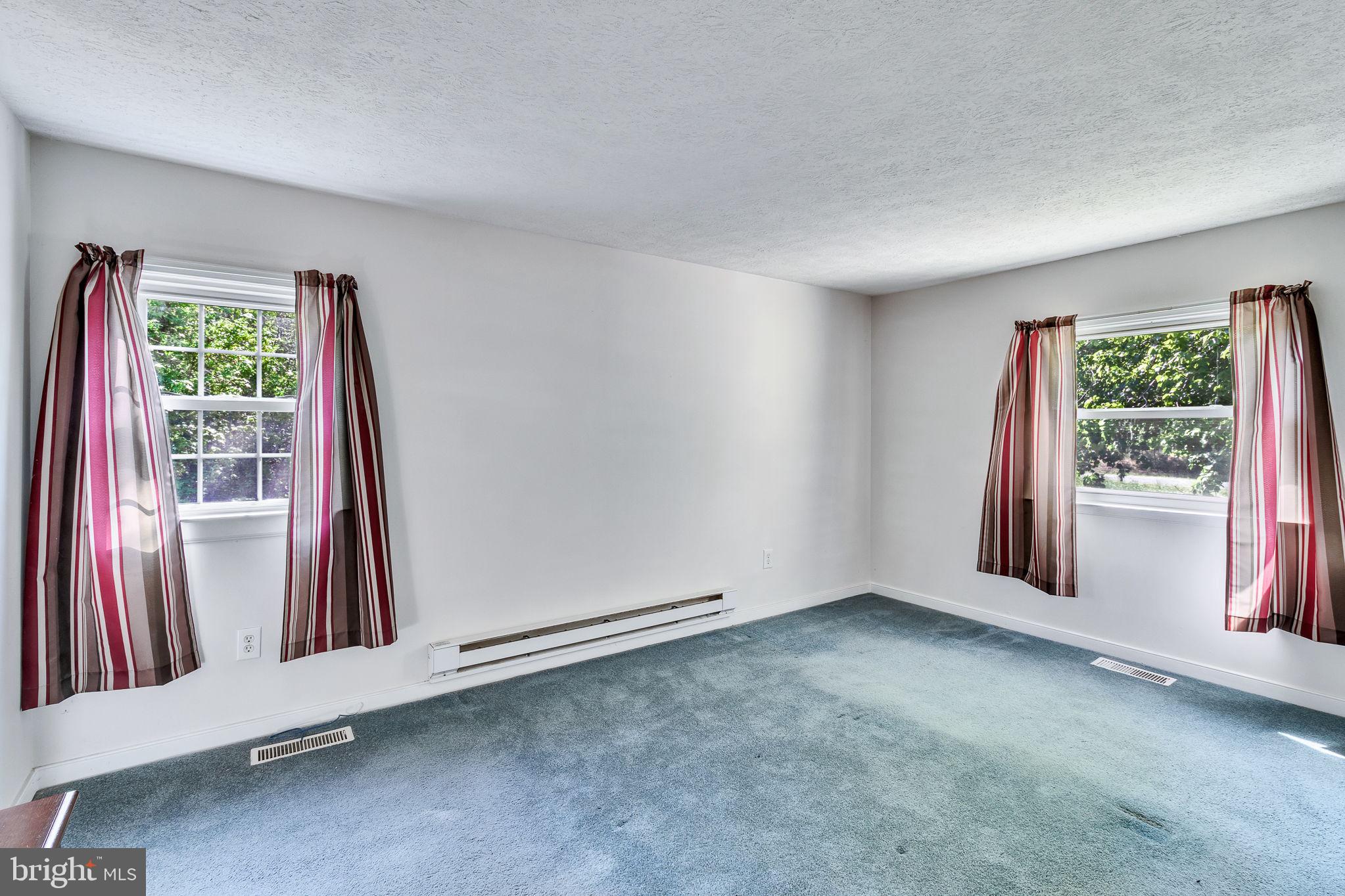 529 Taylors Beach Road Reedville, VA 22539 - Photo 13 of 57 Bright and airy living space awaits.