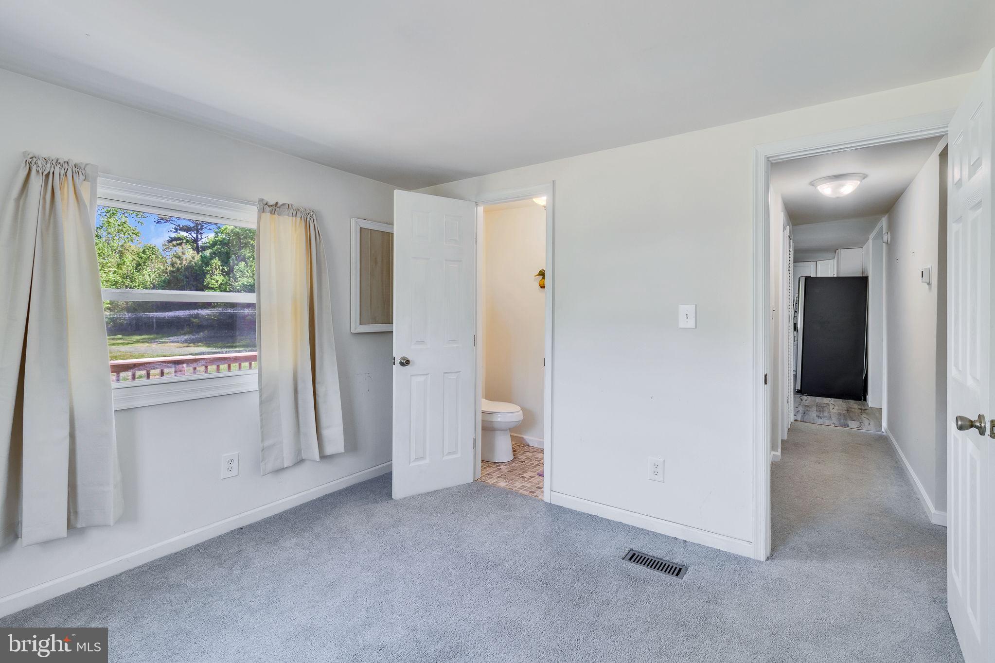529 Taylors Beach Road Reedville, VA 22539 - Photo 14 of 57 Bright and airy room with natural light.