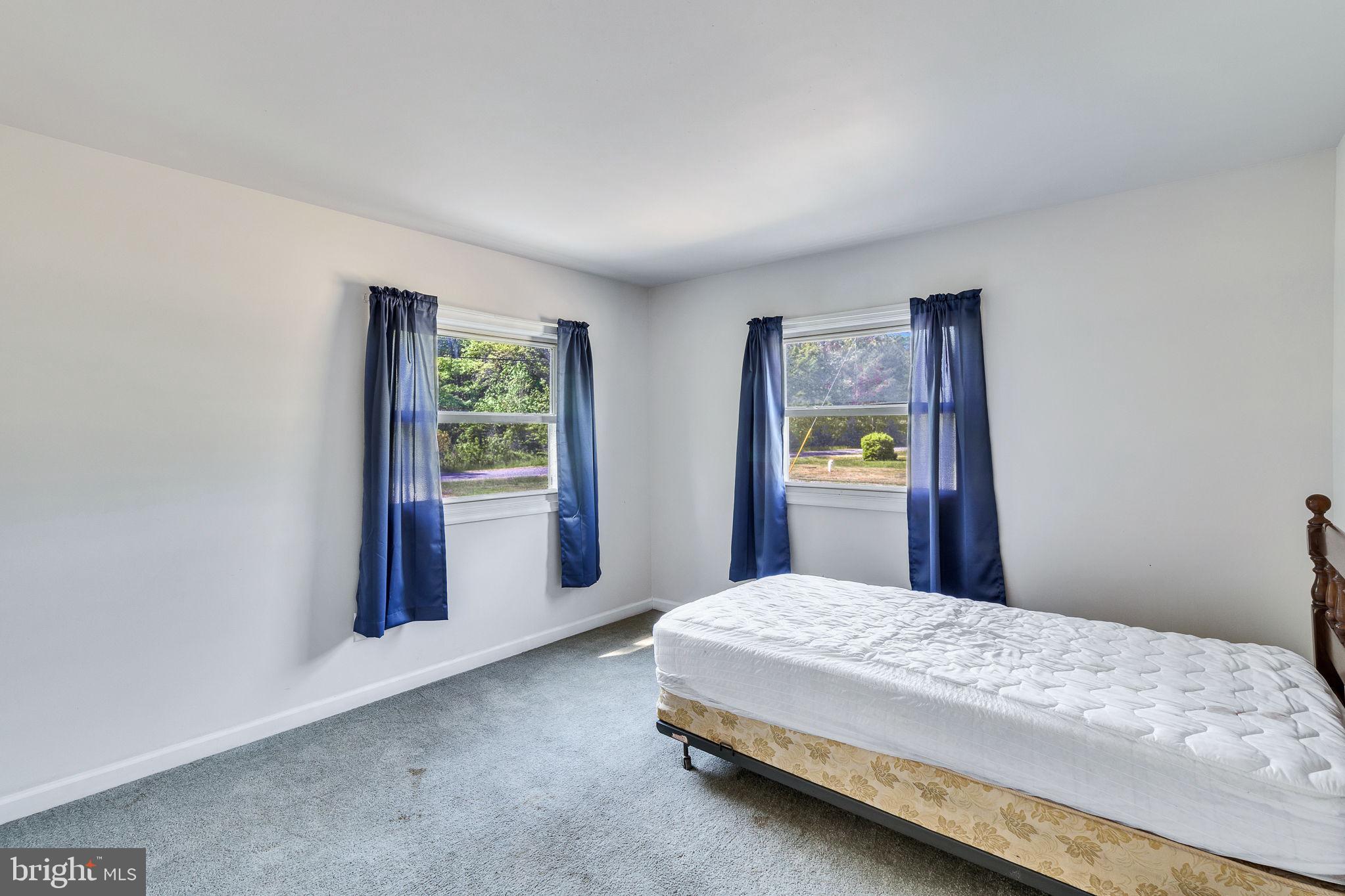529 Taylors Beach Road Reedville, VA 22539 - Photo 15 of 57 Bright and airy bedroom retreat.