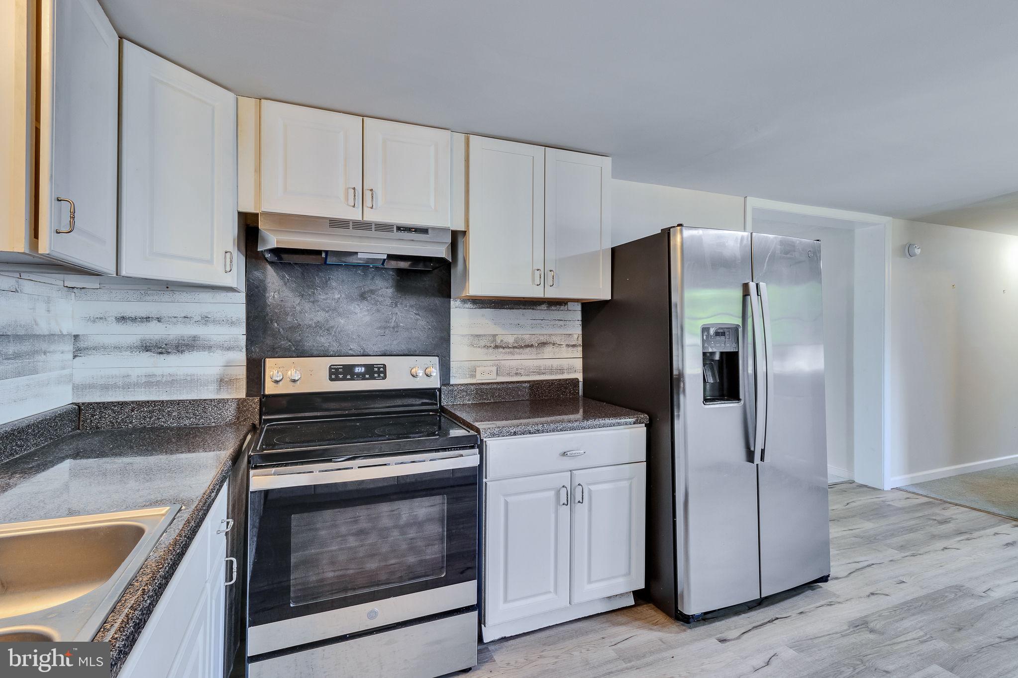 529 Taylors Beach Road Reedville, VA 22539 - Photo 4 of 57 Modern kitchen with sleek finishes.