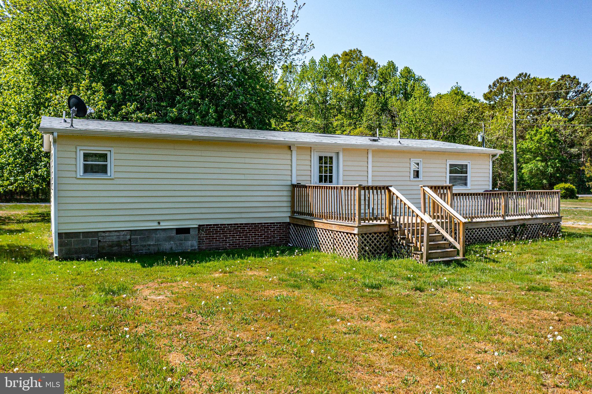 529 Taylors Beach Road Reedville, VA 22539 - Photo 44 of 57 Charming home with inviting deck.