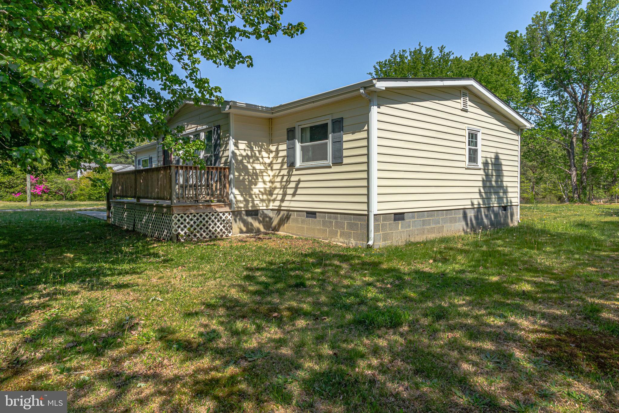 529 Taylors Beach Road Reedville, VA 22539 - Photo 55 of 57 Charming home with lush green surroundings.