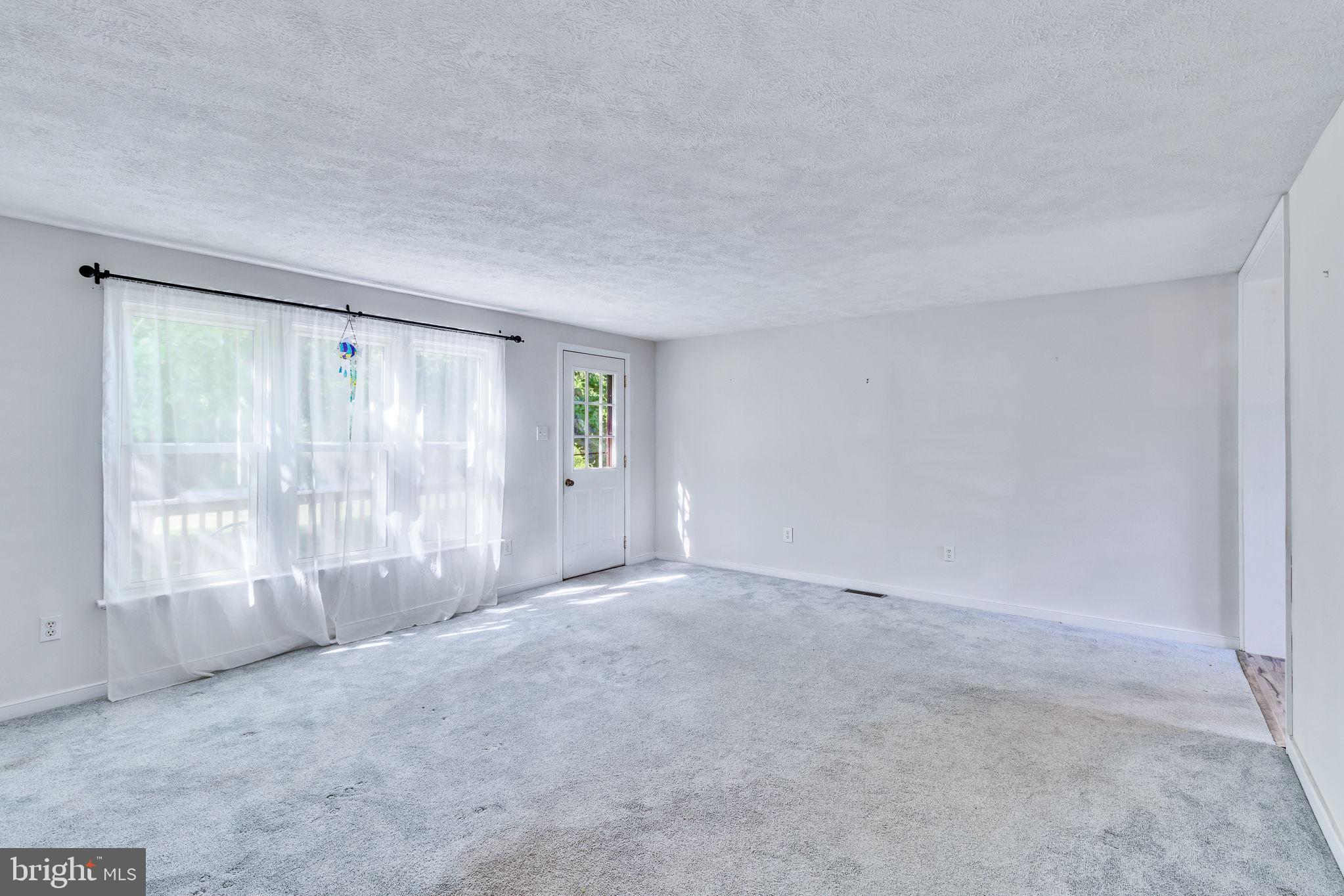 529 Taylors Beach Road Reedville, VA 22539 - Photo 8 of 57 Bright and airy open space awaits.
