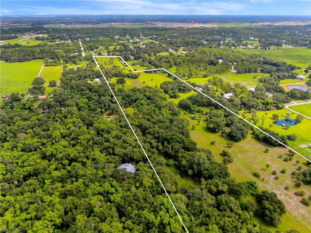 14420 Cemetery Road Fort Myers, FL 33905 - Photo 2 of 5 a view of a city with a lake view