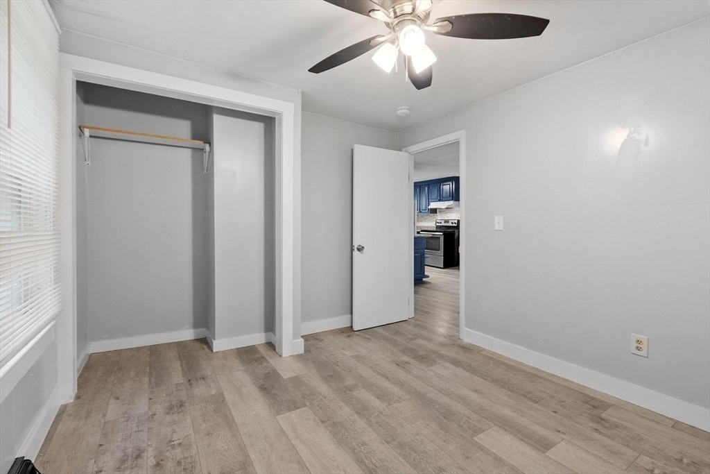258 Allen Road Ashby, MA 01431 - Photo 21 of 36 an empty room with closet and a ceiling fan