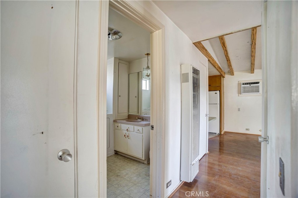 1006 North Orange Avenue Fallbrook, CA 92028 - Photo 16 of 21 view of a bathroom with a sink and mirror