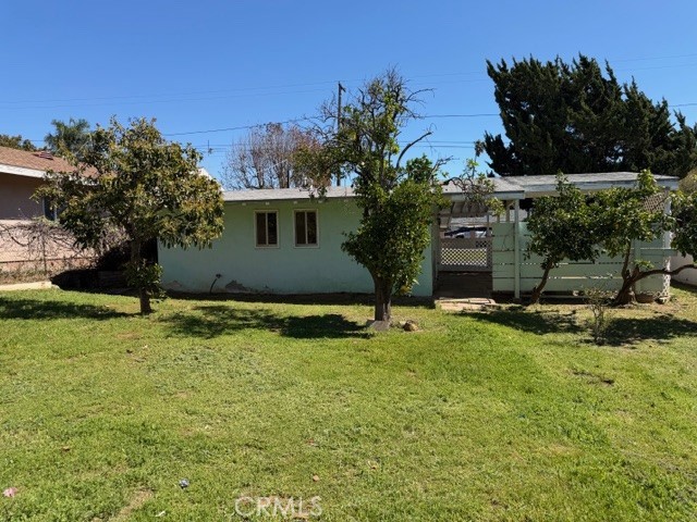 1006 North Orange Avenue Fallbrook, CA 92028 - Photo 21 of 21 a view of a house with a yard