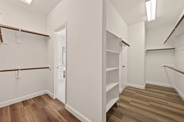 a view of an empty walk in closet