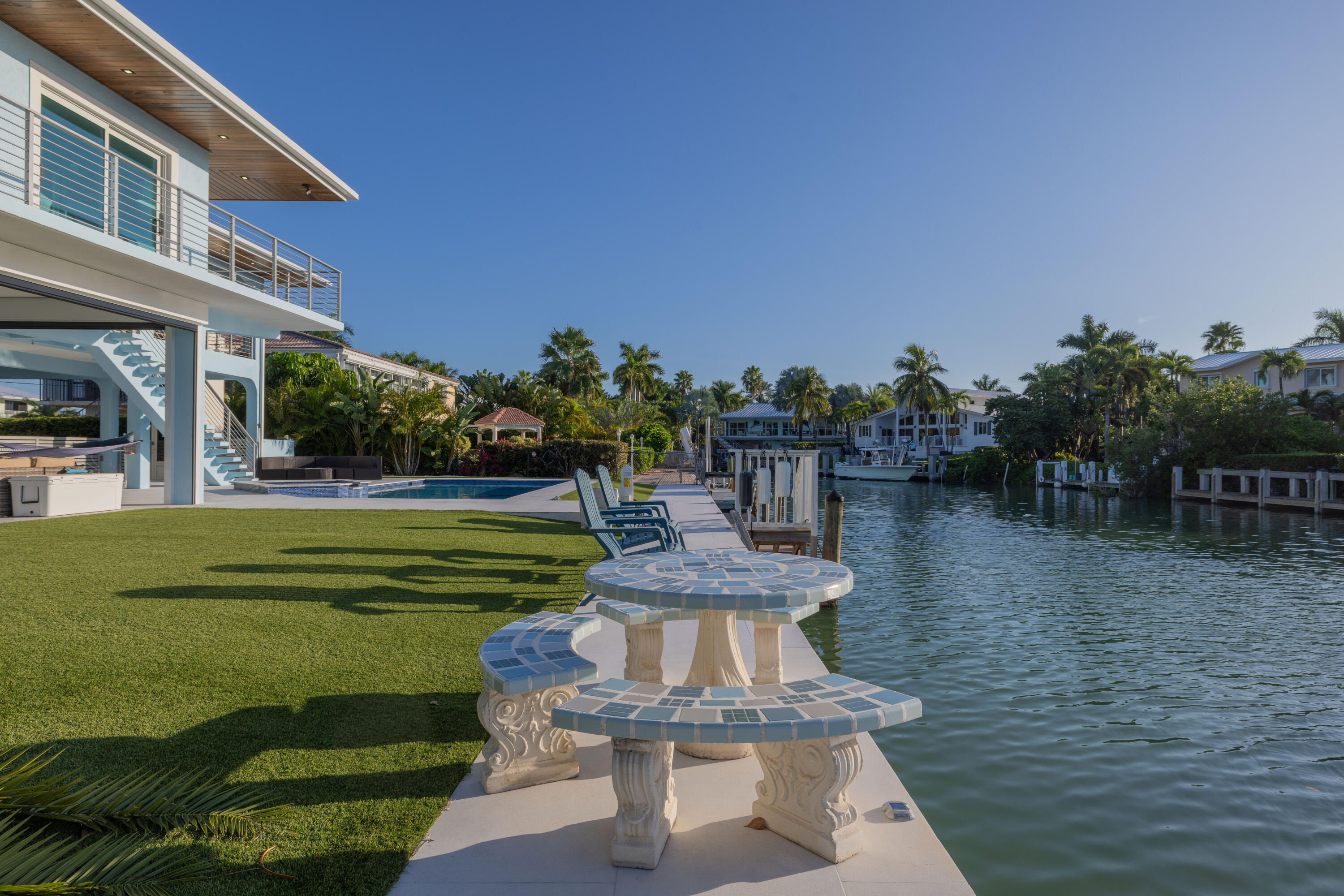 241 12th Street Key Colony Beach, FL 33051 - Photo 29 of 74 a view of a fountain in front of a house