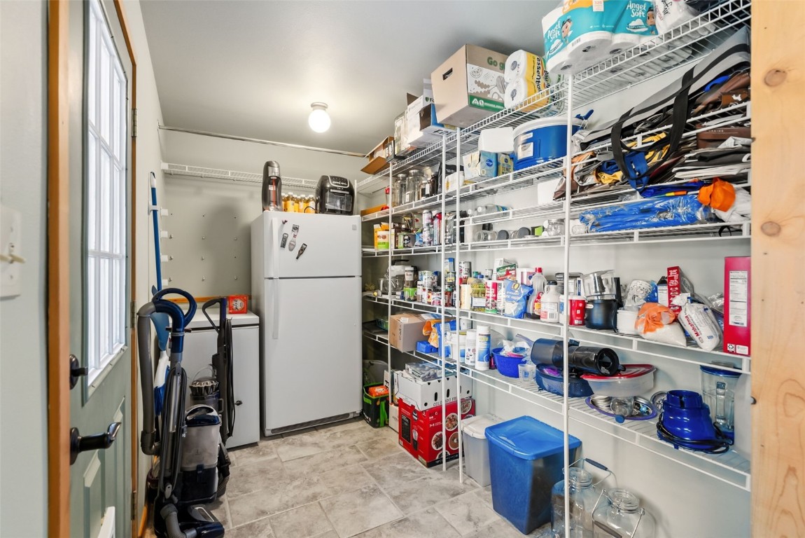 277 G Road Silverthorne, CO 80498 - Photo 23 of 48 Huge pantry w access to back yard and hot tub.