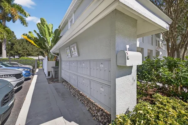 a view of a car park in front of house