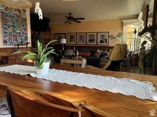 983 Grindelwald Lane, Unit O4 Midway, UT 84049 - Photo 7 of 14 Live-edge wood dining table with a visible natural grain finish