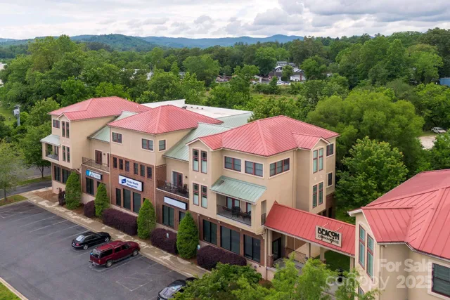 an aerial view of a house with a garden