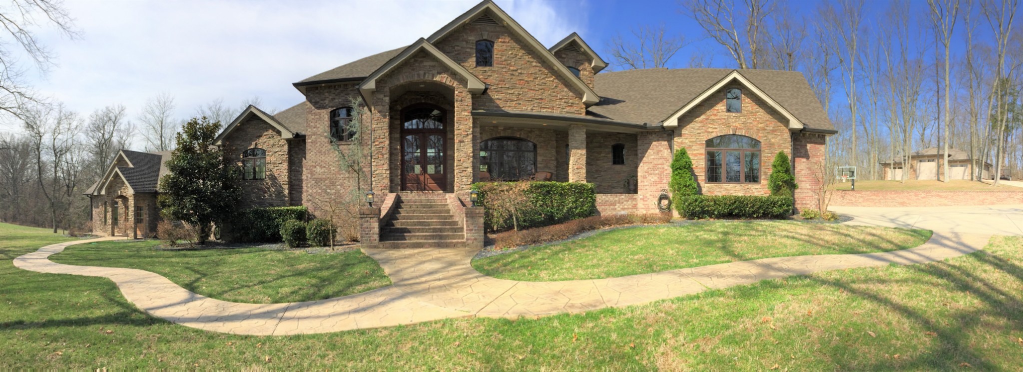 1190 Palmer Road Lebanon, TN 37090 - Photo 1 of 36 a front view of a house with garden