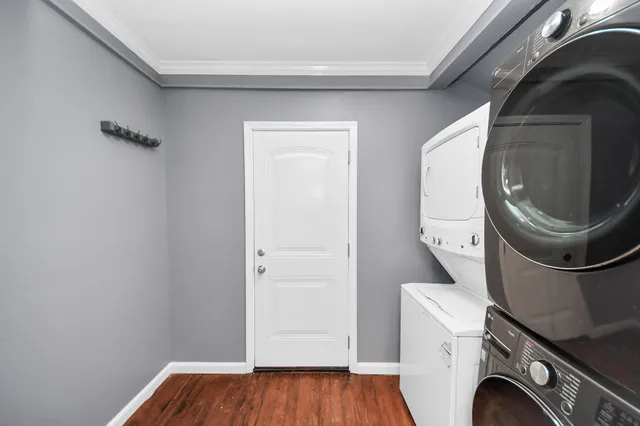 a view of a patio with a table chairs and a backyard