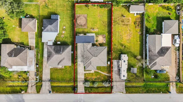 aerial view of residential houses with outdoor space