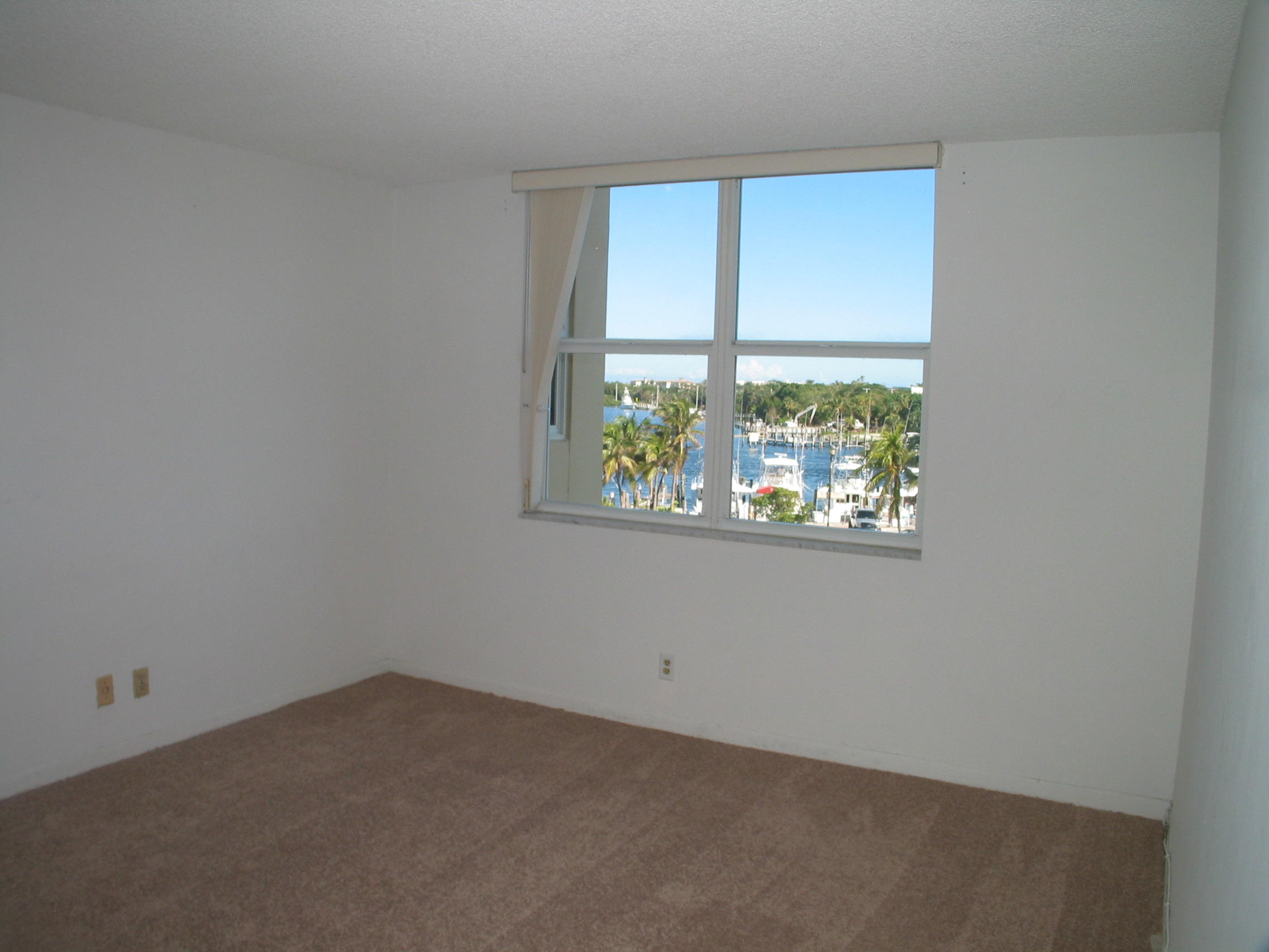 2639 North Riverside Drive, Unit 402 Pompano Beach, FL 33062 - Photo 11 of 17 Master Bedroom