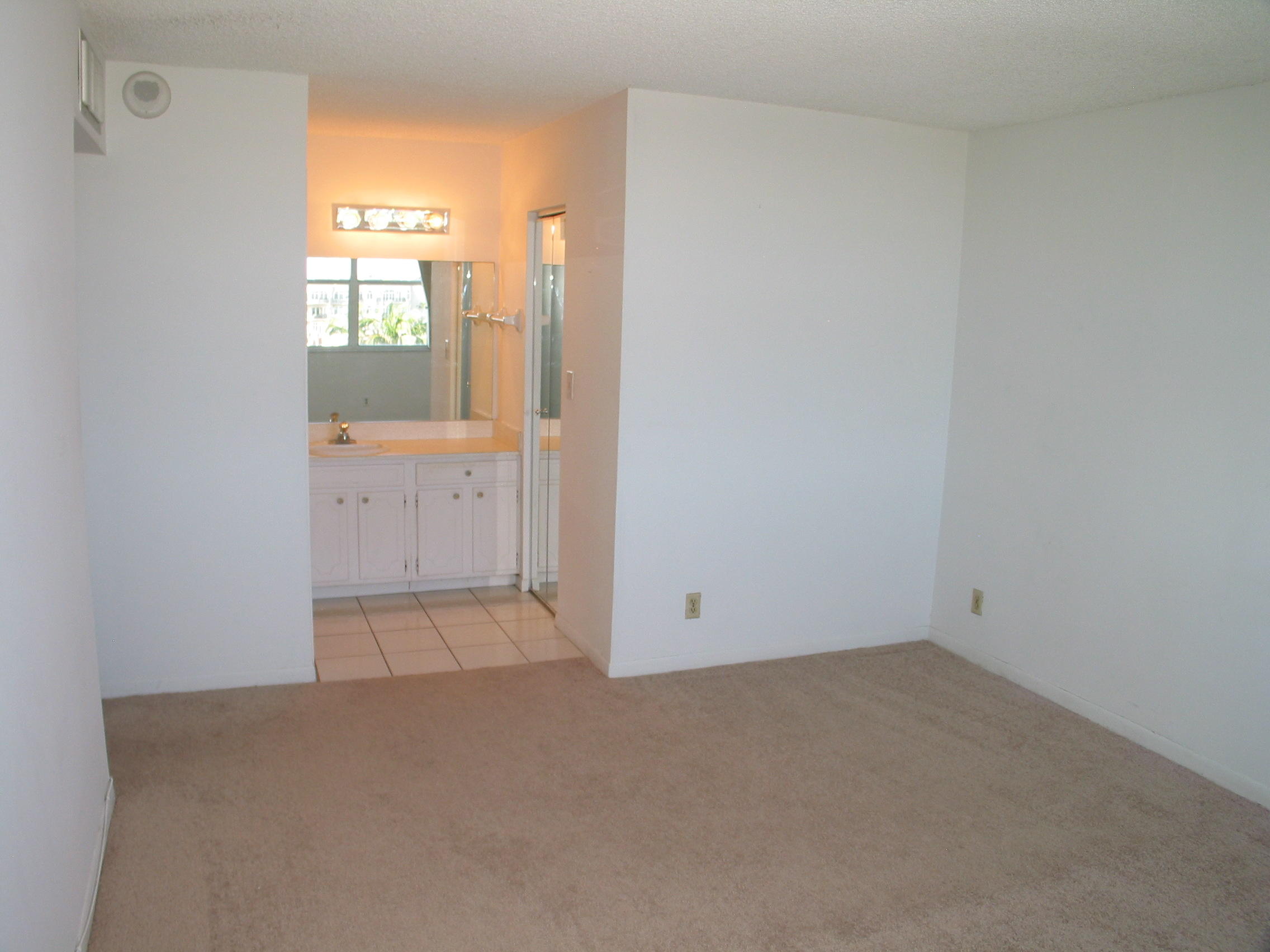 2639 North Riverside Drive, Unit 402 Pompano Beach, FL 33062 - Photo 12 of 17 Master Bedroom
