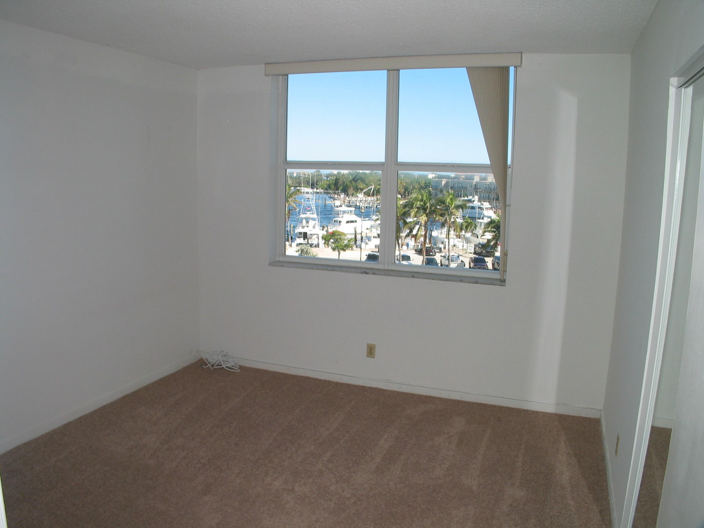 2639 North Riverside Drive, Unit 402 Pompano Beach, FL 33062 - Photo 15 of 17 Second Bedroom