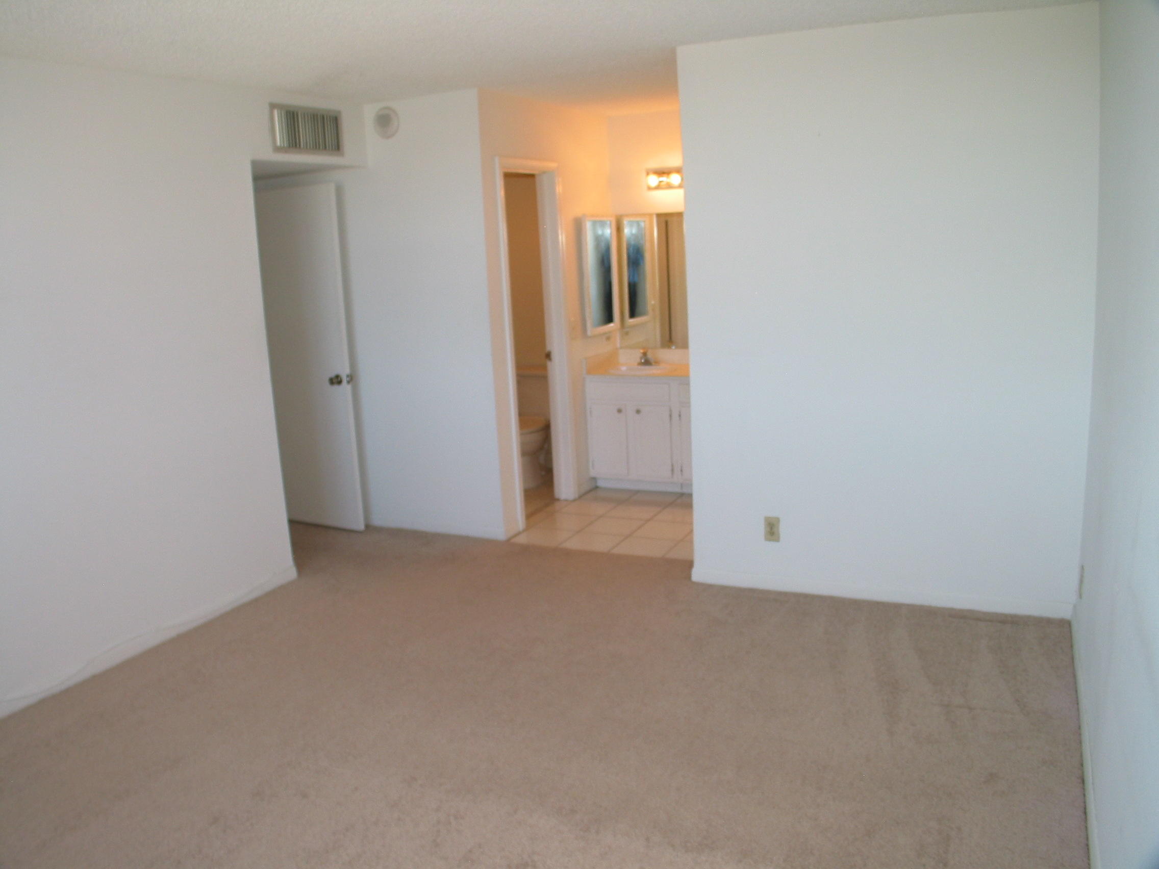 2639 North Riverside Drive, Unit 402 Pompano Beach, FL 33062 - Photo 9 of 17 Master Bedroom