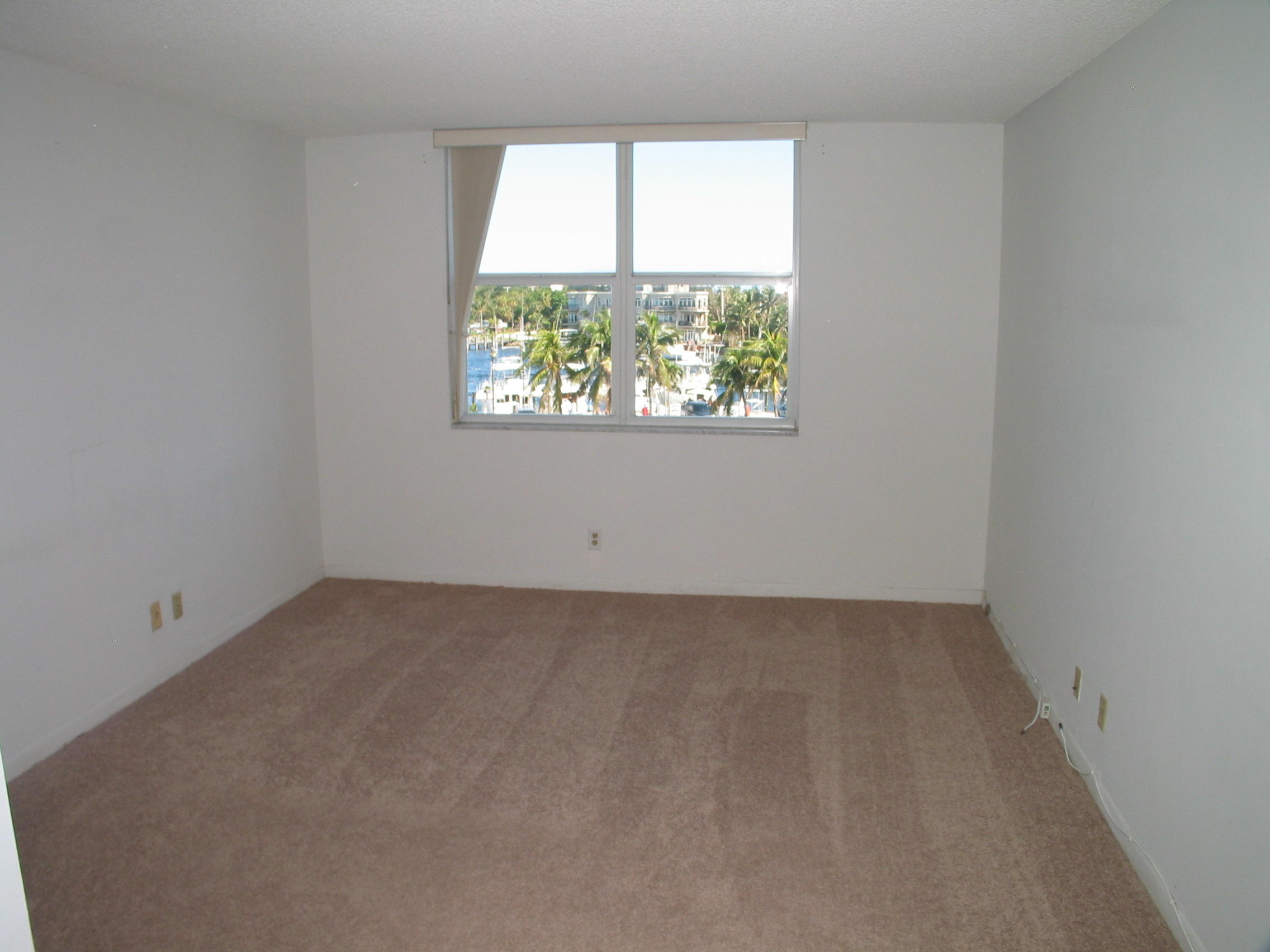 2639 North Riverside Drive, Unit 402 Pompano Beach, FL 33062 - Photo 10 of 17 Master Bedroom