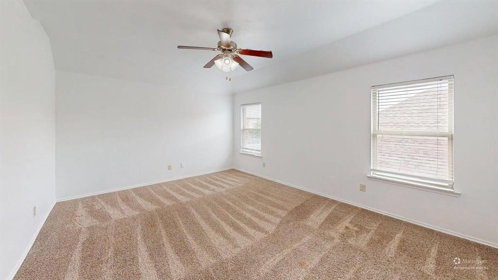 101 Rocky Pine Road McKinney, TX 75072 - Photo 27 of 39 a view of empty room with windows