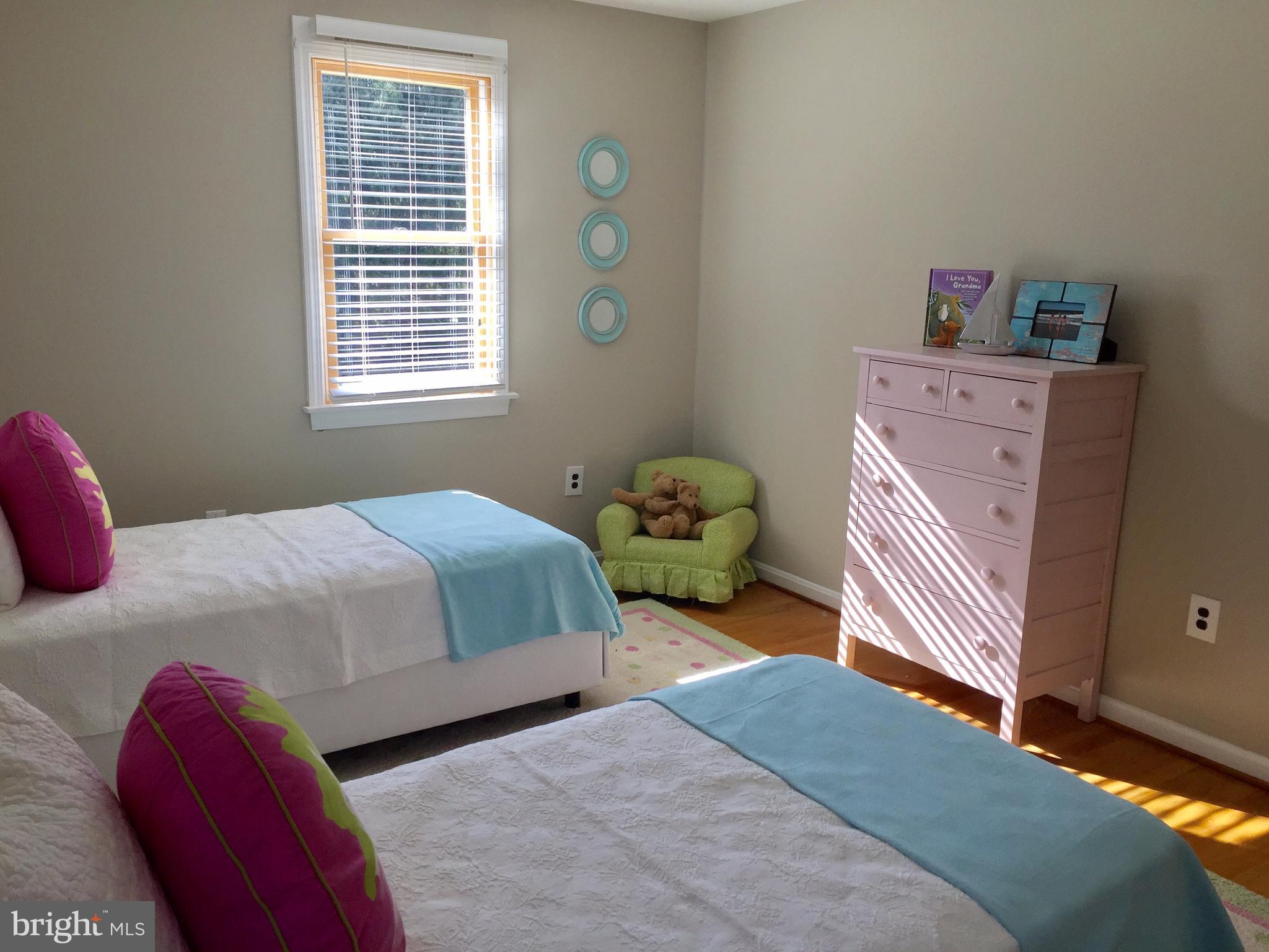 14220 Manor Road Phoenix, MD 21131 - Photo 20 of 25 a bedroom with a bed and a window