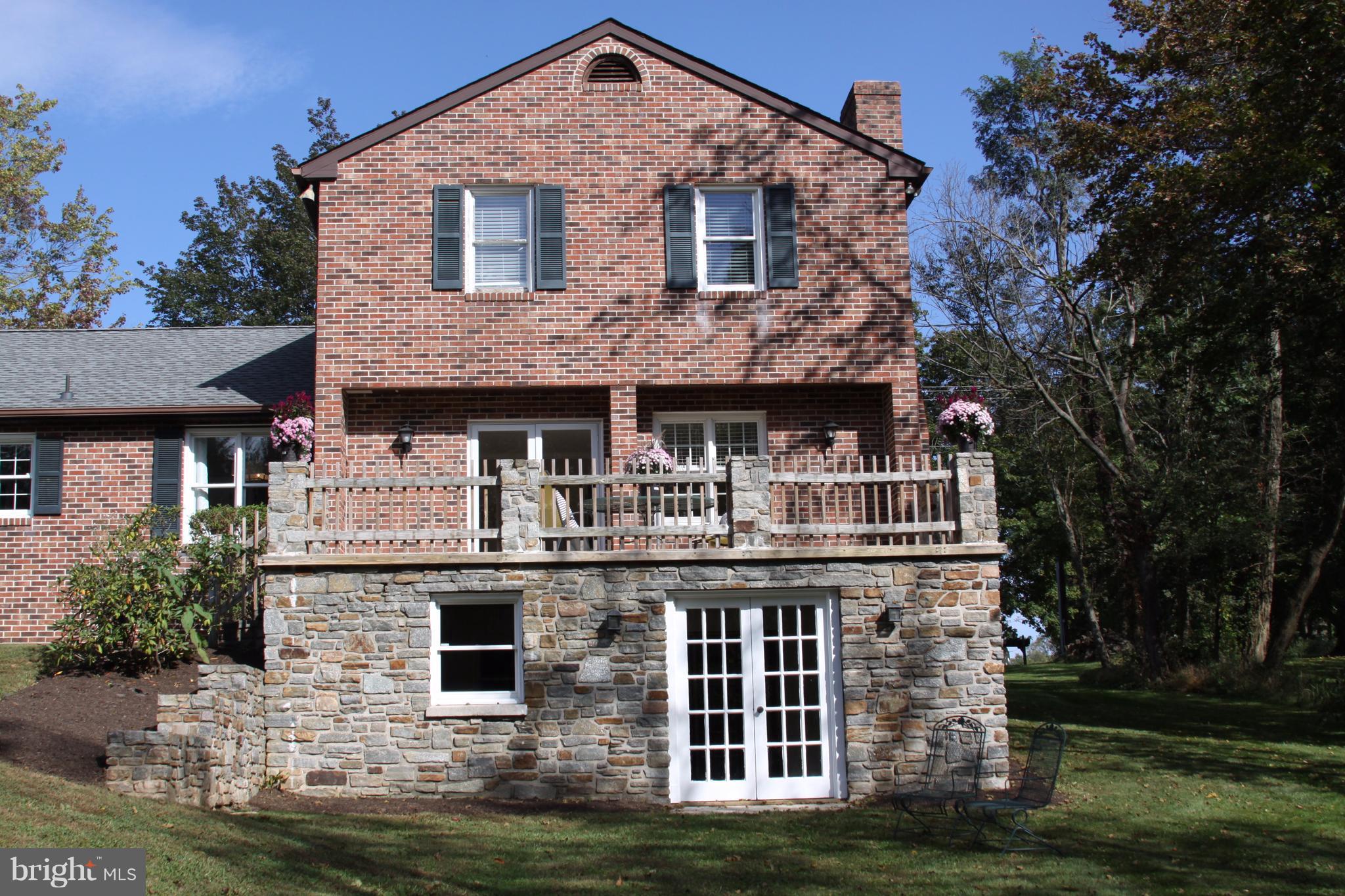 14220 Manor Road Phoenix, MD 21131 - Photo 23 of 25 a front view of a house with a yard