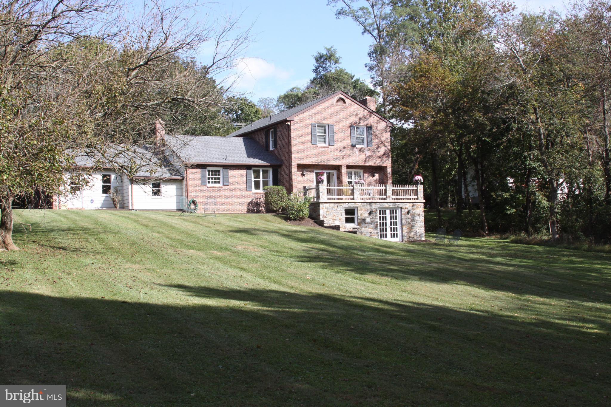 14220 Manor Road Phoenix, MD 21131 - Photo 24 of 25 a front view of a house with a garden