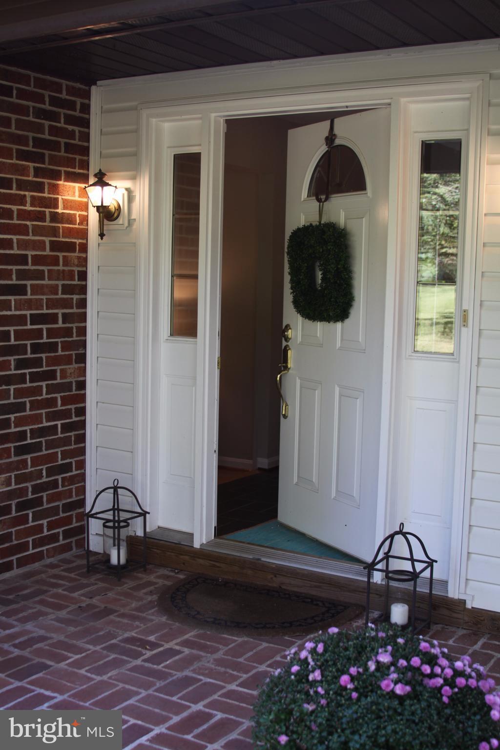 14220 Manor Road Phoenix, MD 21131 - Photo 4 of 25 a view of entryway with wooden door