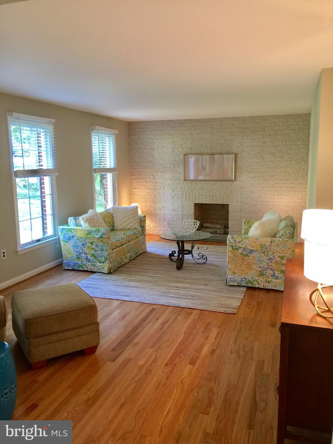 14220 Manor Road Phoenix, MD 21131 - Photo 6 of 25 a living room with furniture and a wooden floor