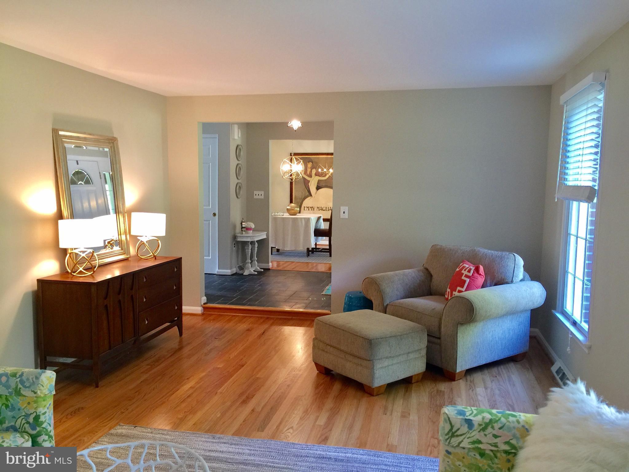 14220 Manor Road Phoenix, MD 21131 - Photo 7 of 25 a living room with furniture and wooden floor