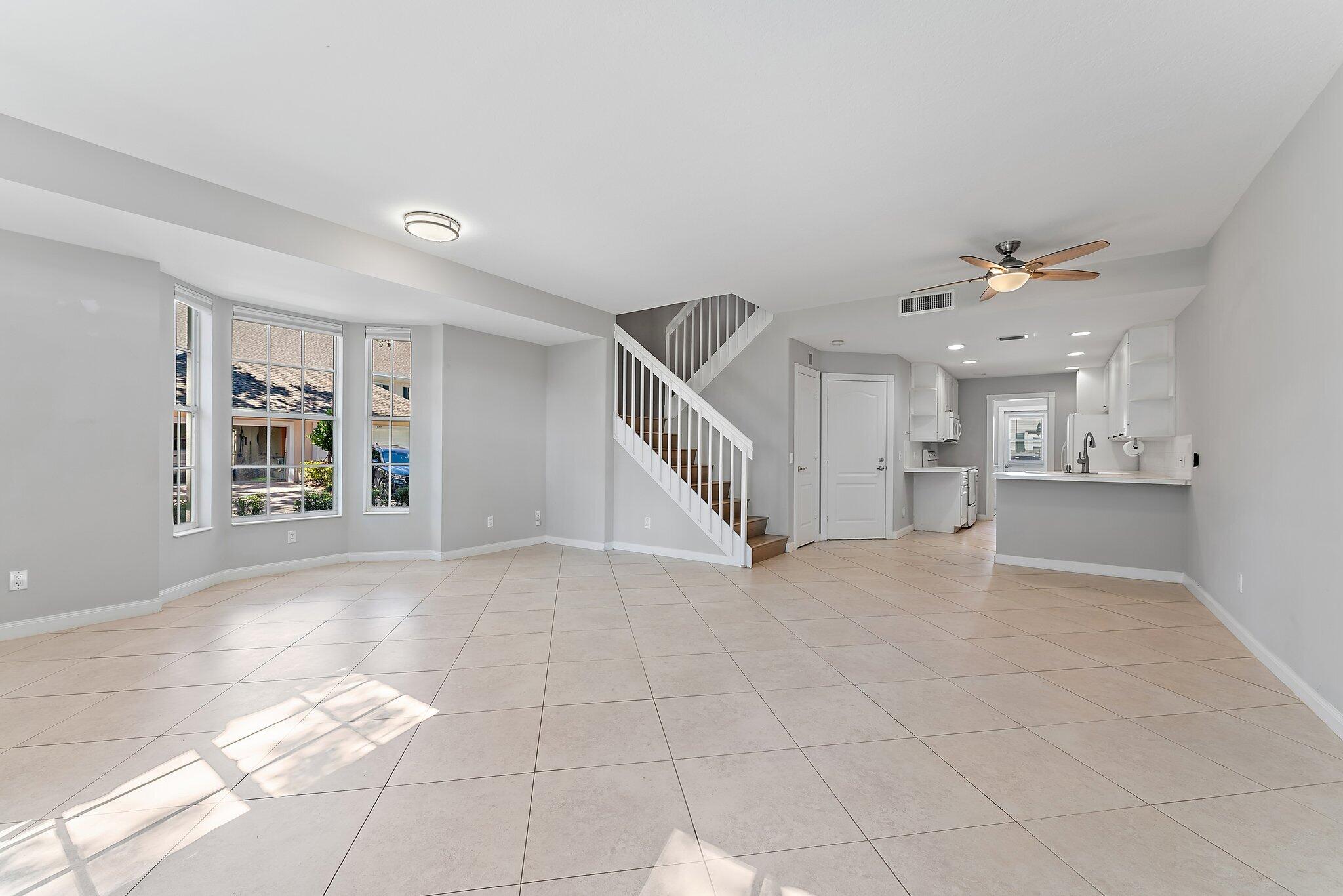 352 Legare Court Jupiter, FL 33458 - Photo 8 of 49 Living Area & Kitchen