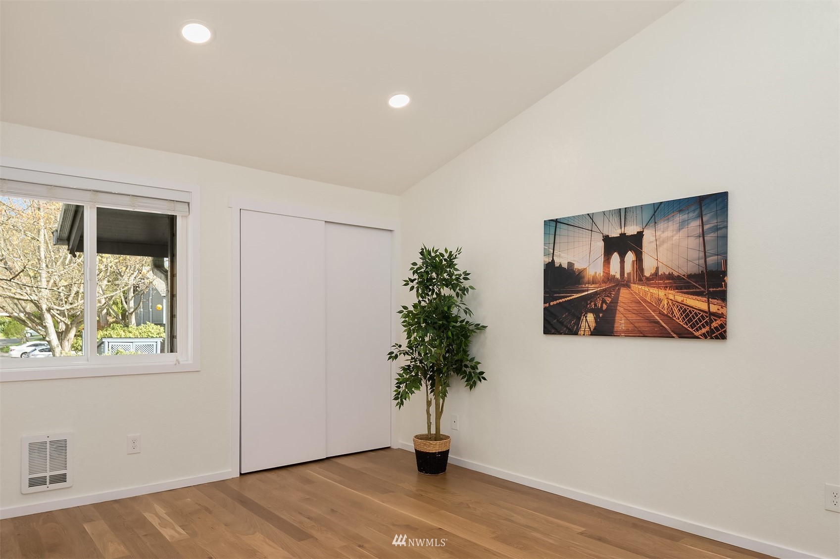 8418 240th Street Southwest, Unit A303 Edmonds, WA 98026 - Photo 11 of 23 a view of a hallway with a flower pot