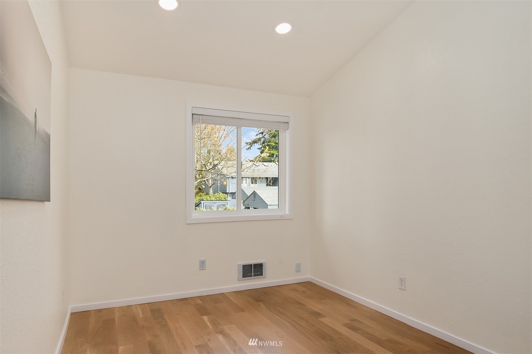8418 240th Street Southwest, Unit A303 Edmonds, WA 98026 - Photo 13 of 23 an empty room with a window