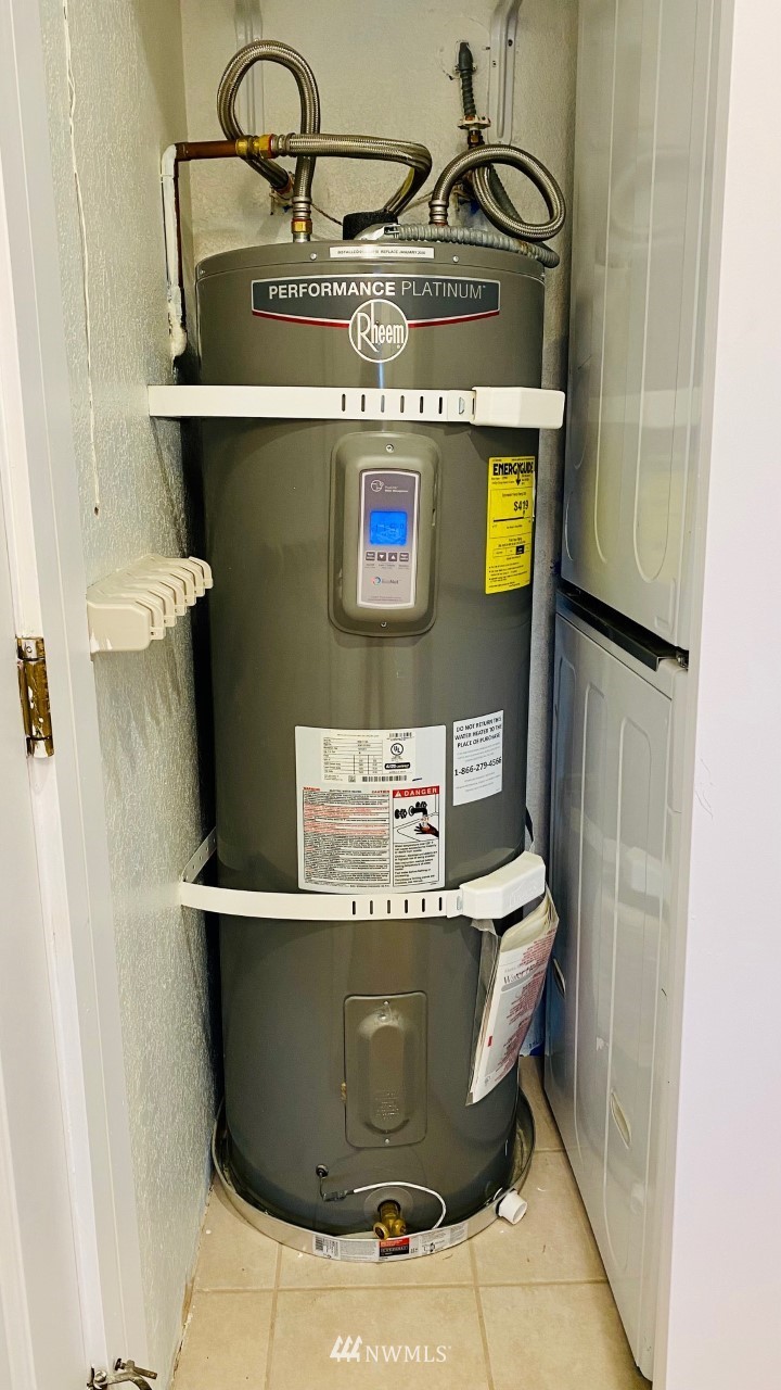 8418 240th Street Southwest, Unit A303 Edmonds, WA 98026 - Photo 20 of 23 a view of a sink with storage