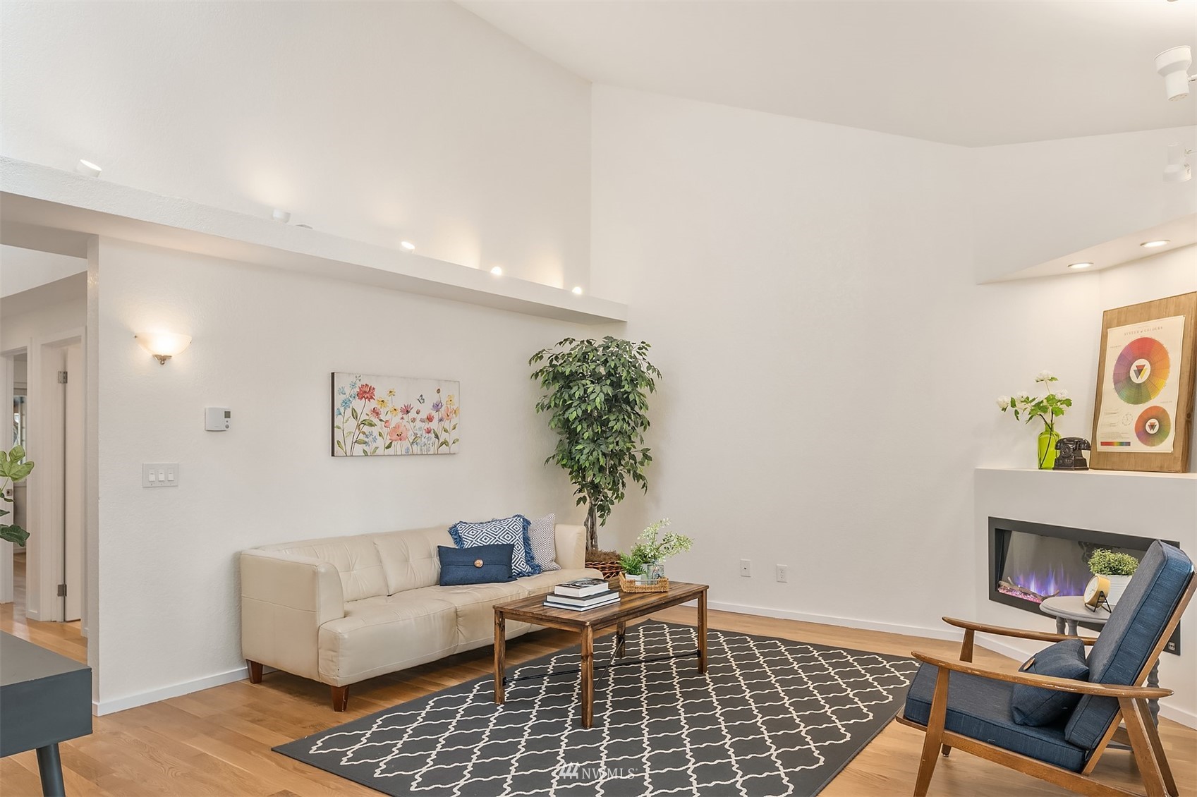 8418 240th Street Southwest, Unit A303 Edmonds, WA 98026 - Photo 3 of 23 a living room with furniture and a couch