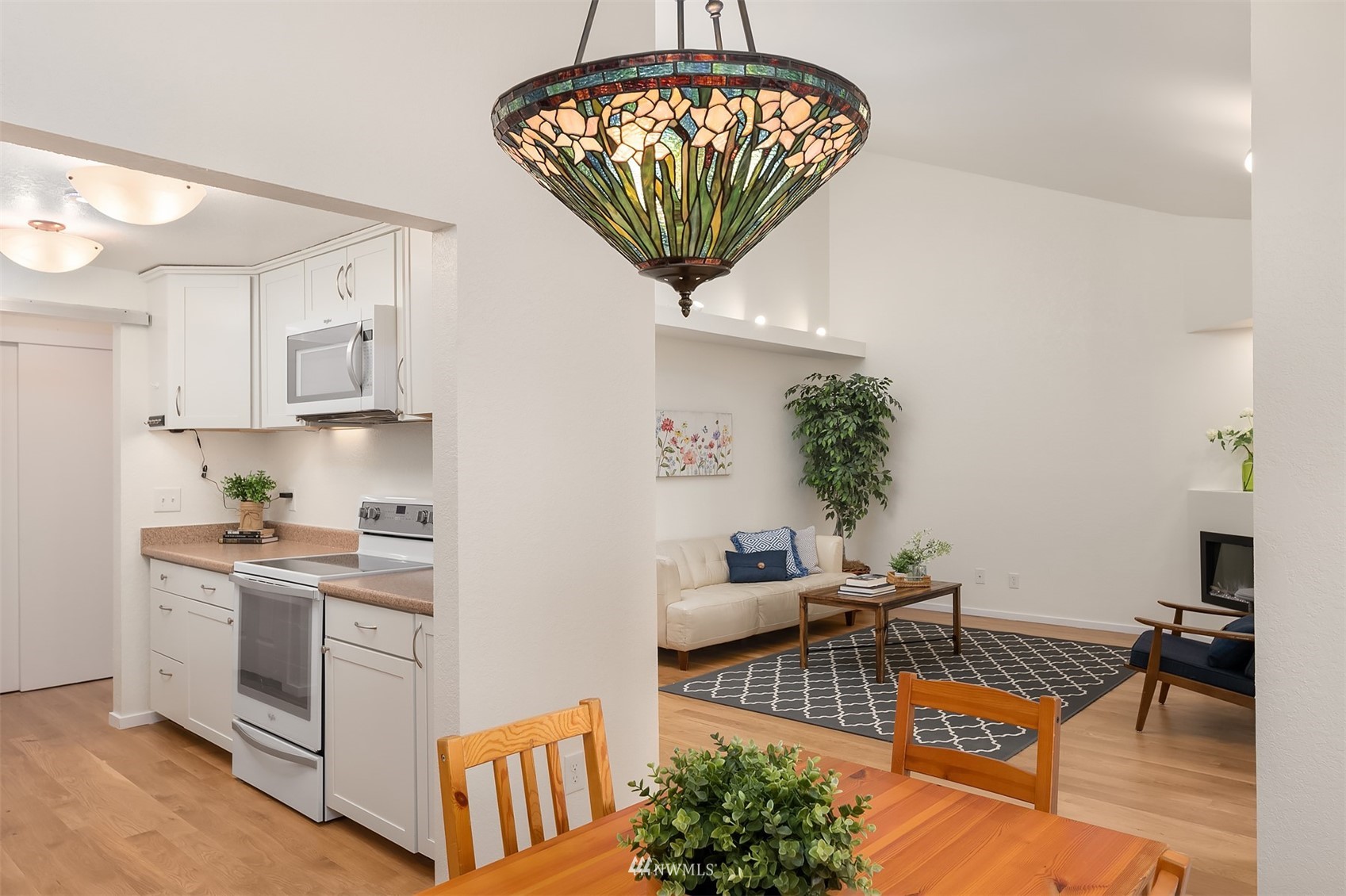 8418 240th Street Southwest, Unit A303 Edmonds, WA 98026 - Photo 9 of 23 a very nice looking kitchen with a large window
