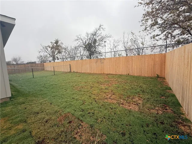 a view of an outdoor space and a yard