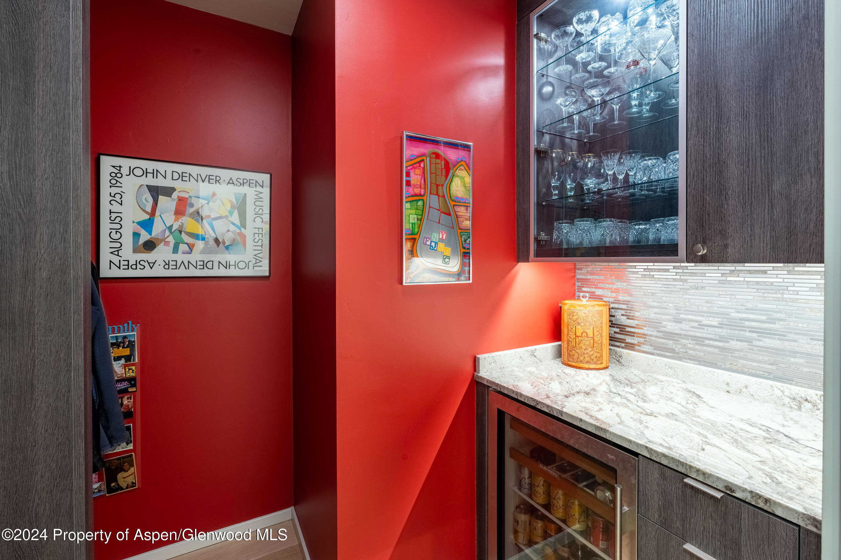 101 Willits Lane, Unit 203 Basalt, CO 81621 - Photo 15 of 37 a bathroom with a granite countertop sink and a painting on the wall