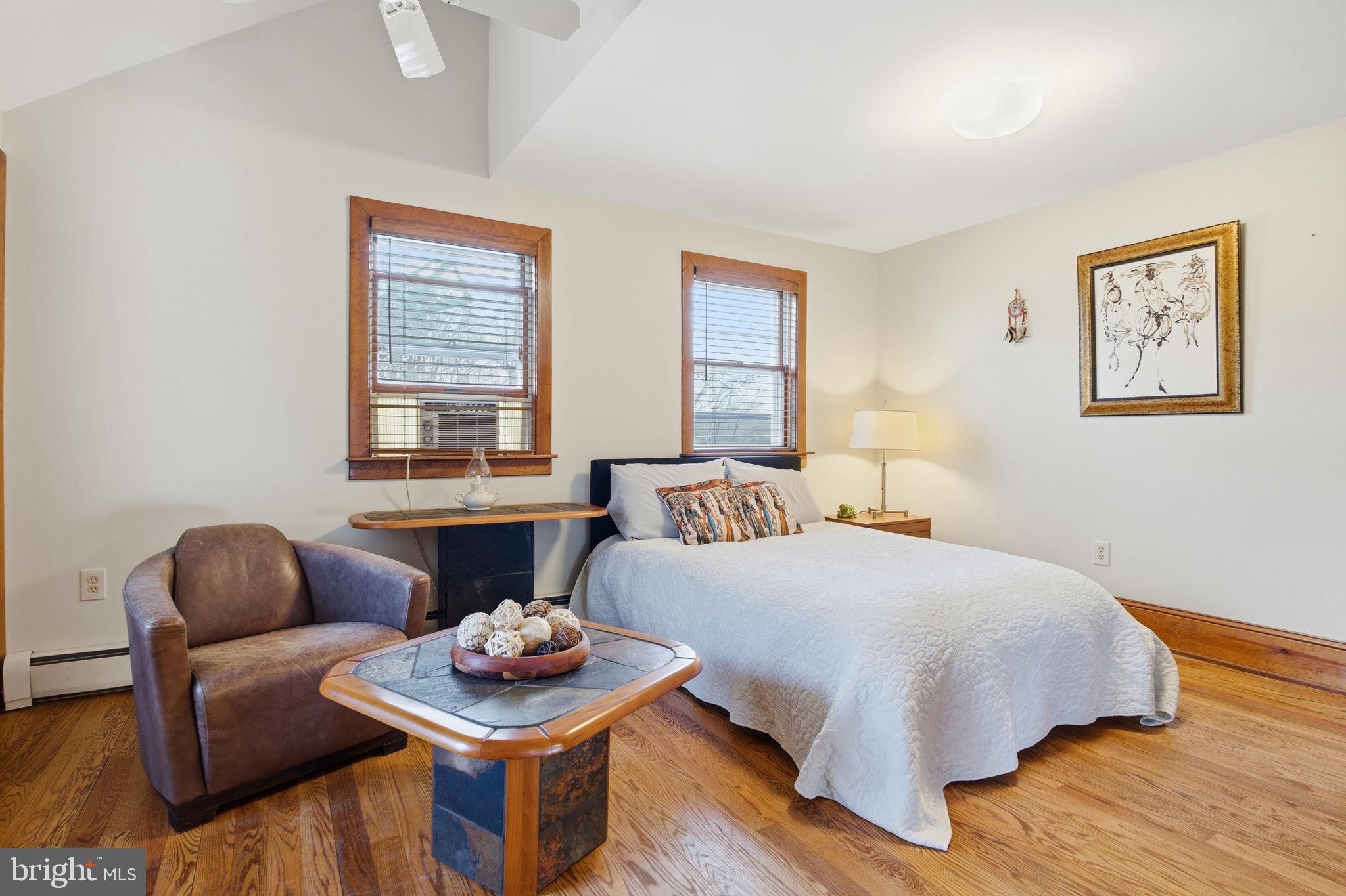 21627 Gunpowder Road Manchester, MD 21102 - Photo 15 of 32 a bedroom with a bed and wooden floor
