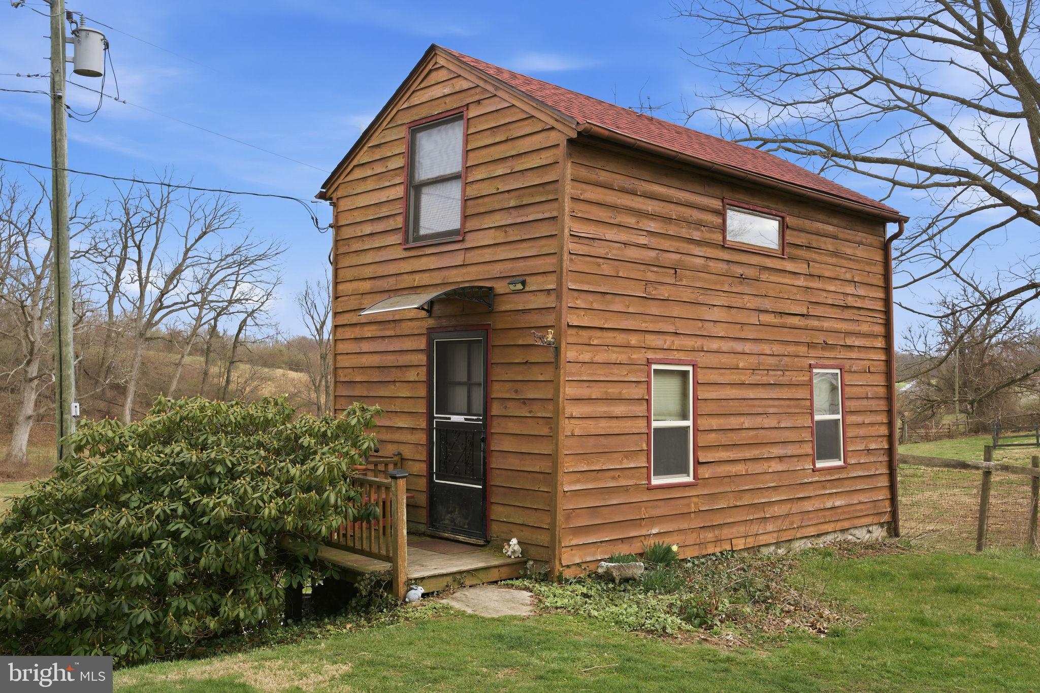 21627 Gunpowder Road Manchester, MD 21102 - Photo 20 of 32 a view of a house with a yard