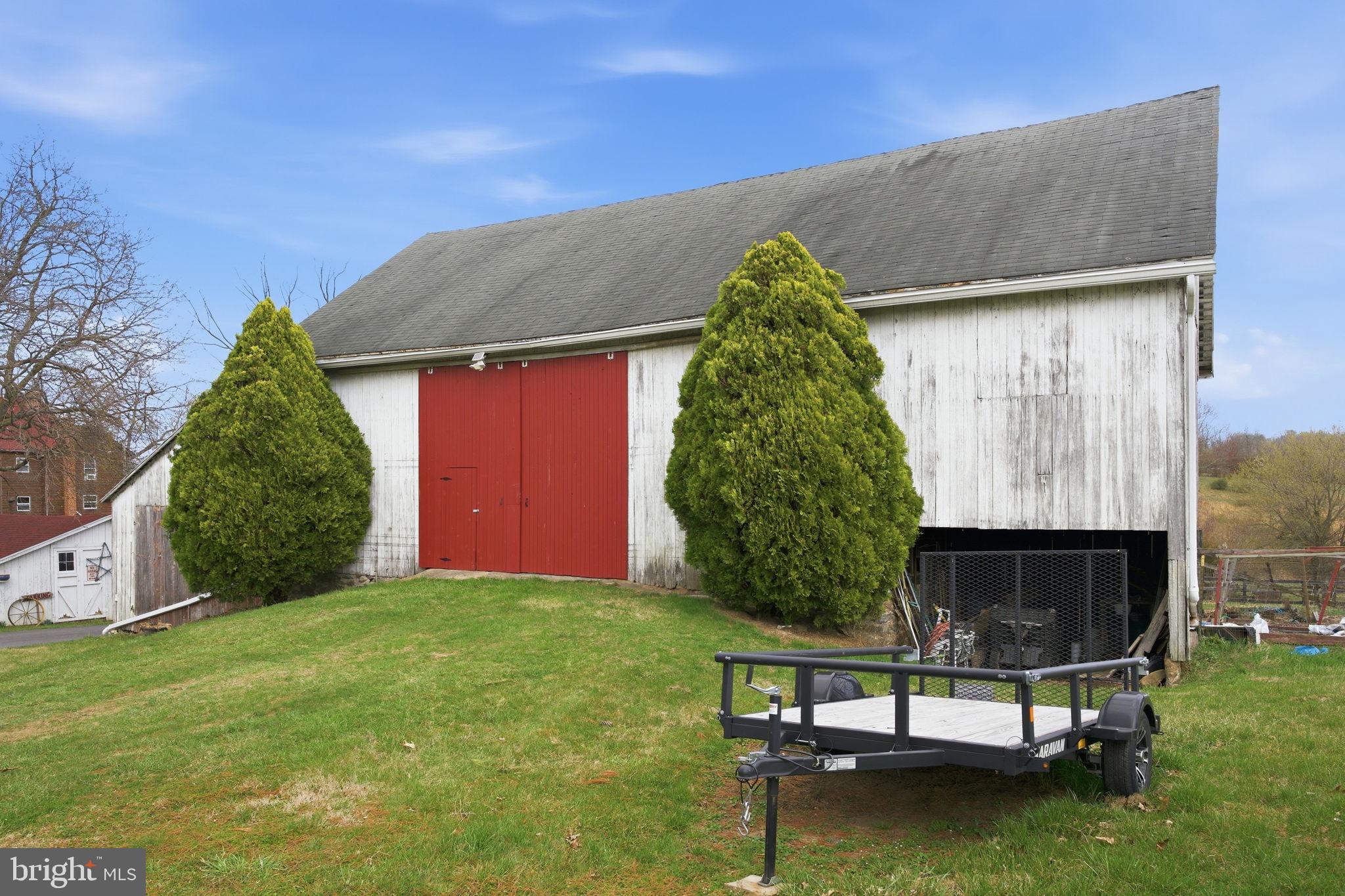 21627 Gunpowder Road Manchester, MD 21102 - Photo 25 of 32 a front view of a house with garden