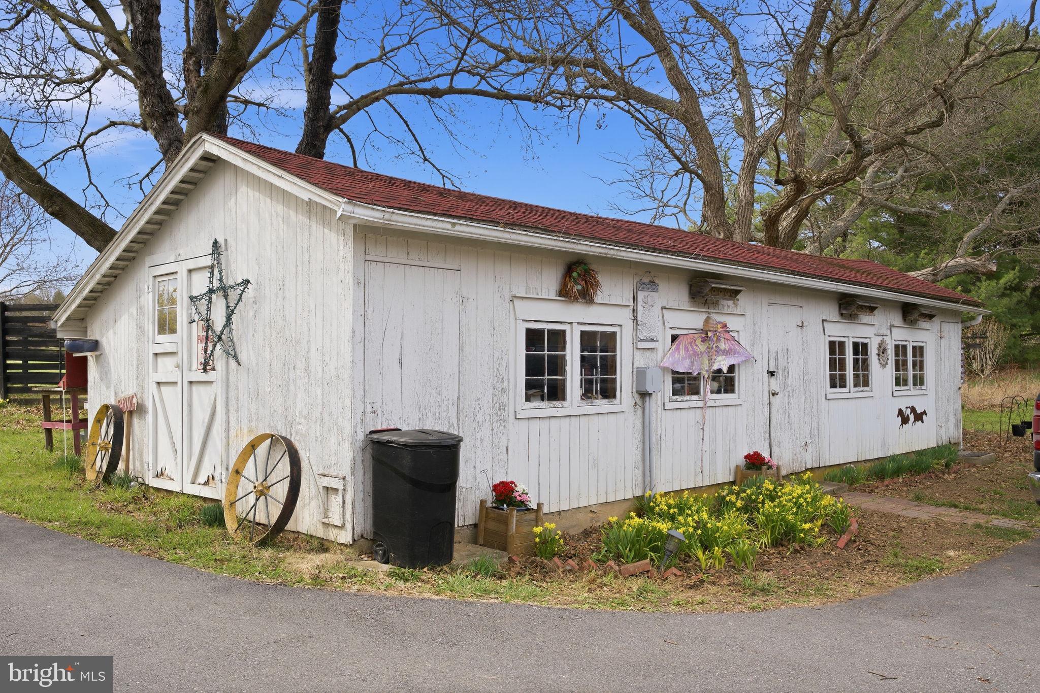21627 Gunpowder Road Manchester, MD 21102 - Photo 27 of 32 a front view of a house with garden