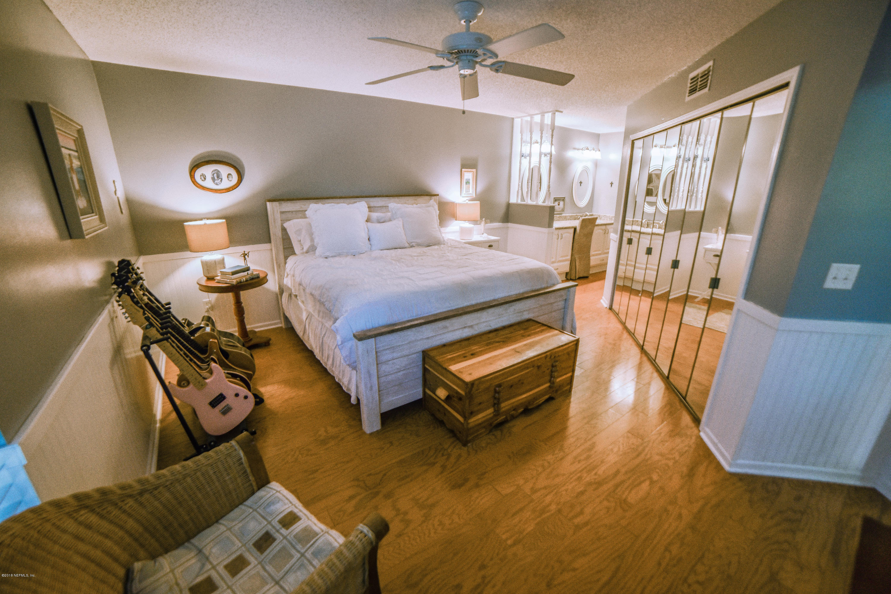 1 Turtleback Trail Ponte Vedra Beach, FL 32082 - Photo 12 of 23 a bedroom with a bed and wooden floor