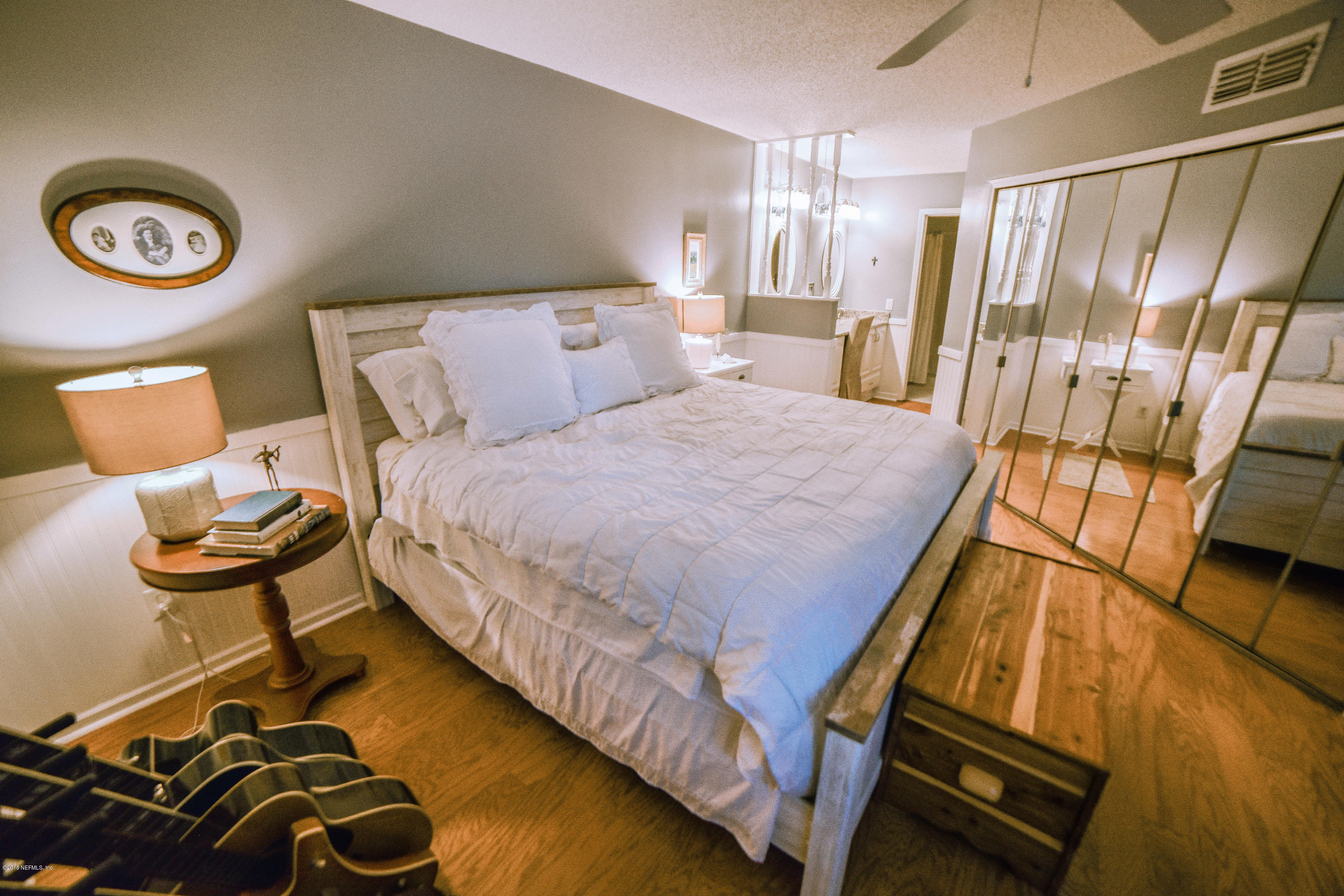 1 Turtleback Trail Ponte Vedra Beach, FL 32082 - Photo 13 of 23 a bedroom with a bed and a table with rug