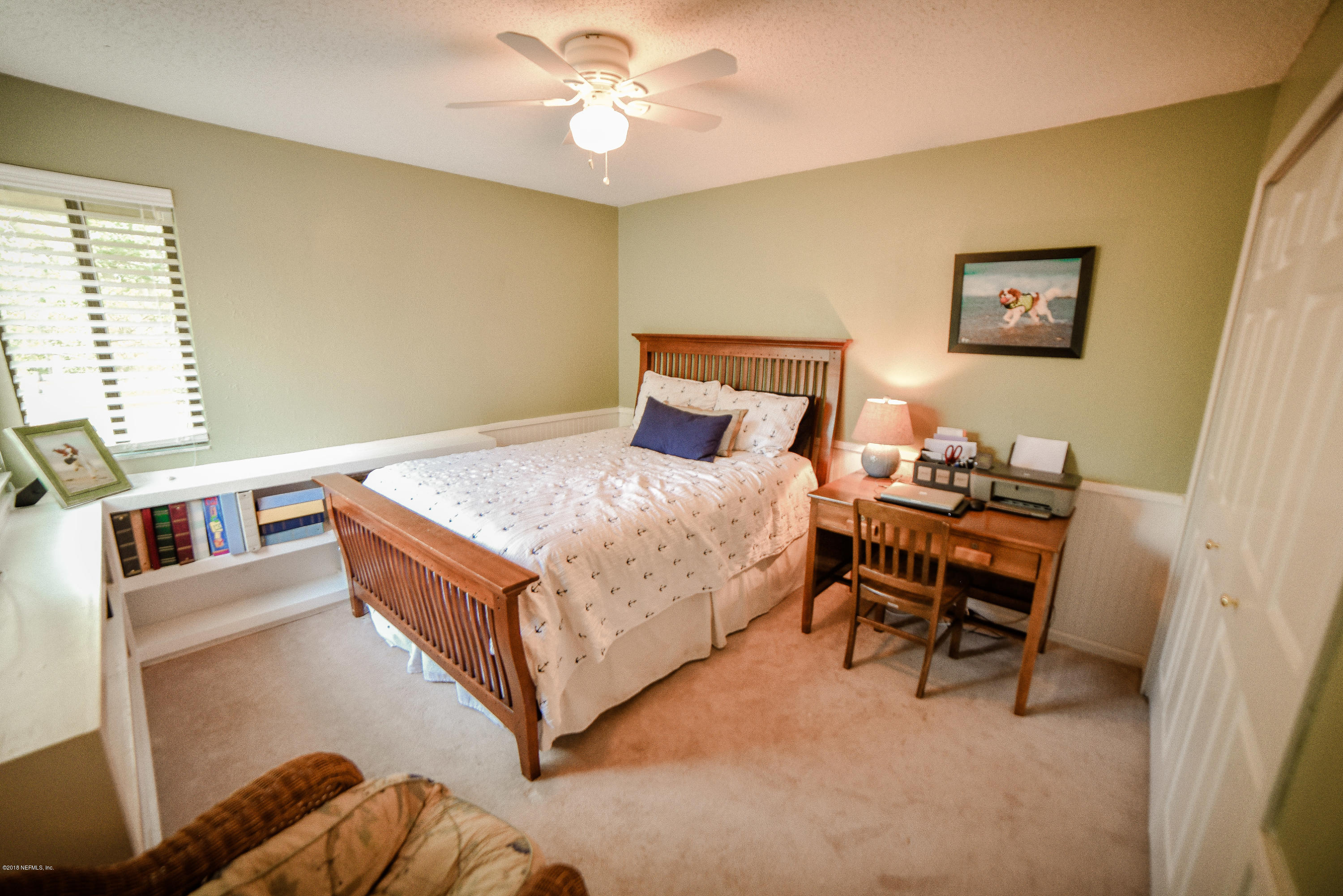 1 Turtleback Trail Ponte Vedra Beach, FL 32082 - Photo 17 of 23 a bed room with a bed and a chair
