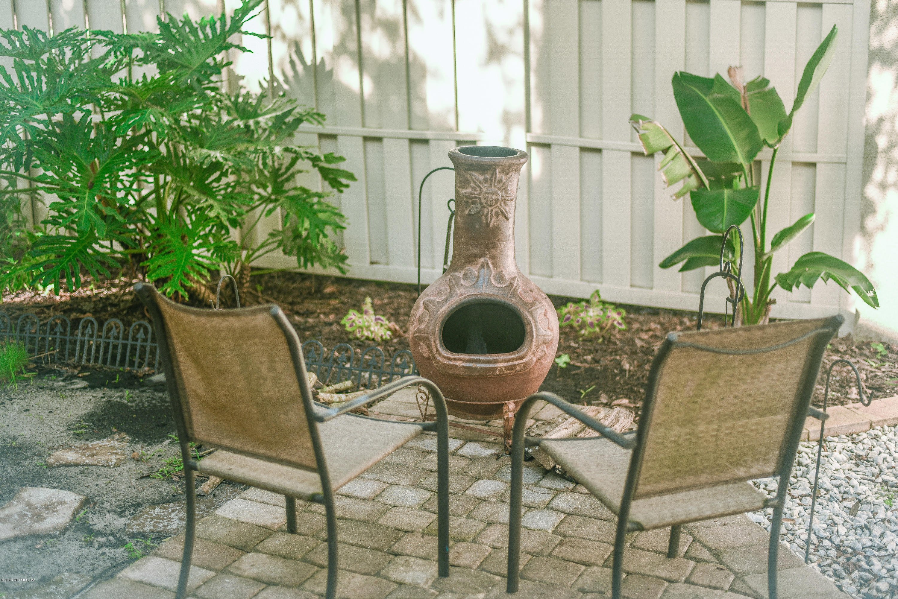 1 Turtleback Trail Ponte Vedra Beach, FL 32082 - Photo 19 of 23 a view of backyard of house with seating space