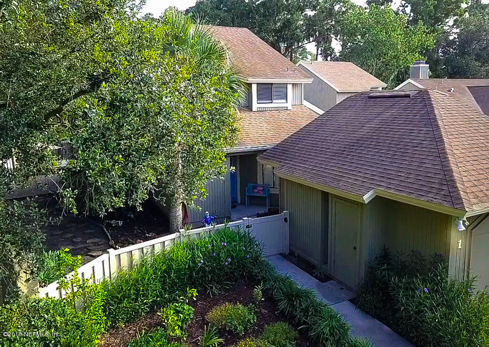 1 Turtleback Trail Ponte Vedra Beach, FL 32082 - Photo 2 of 23 a aerial view of a house with a yard and trees